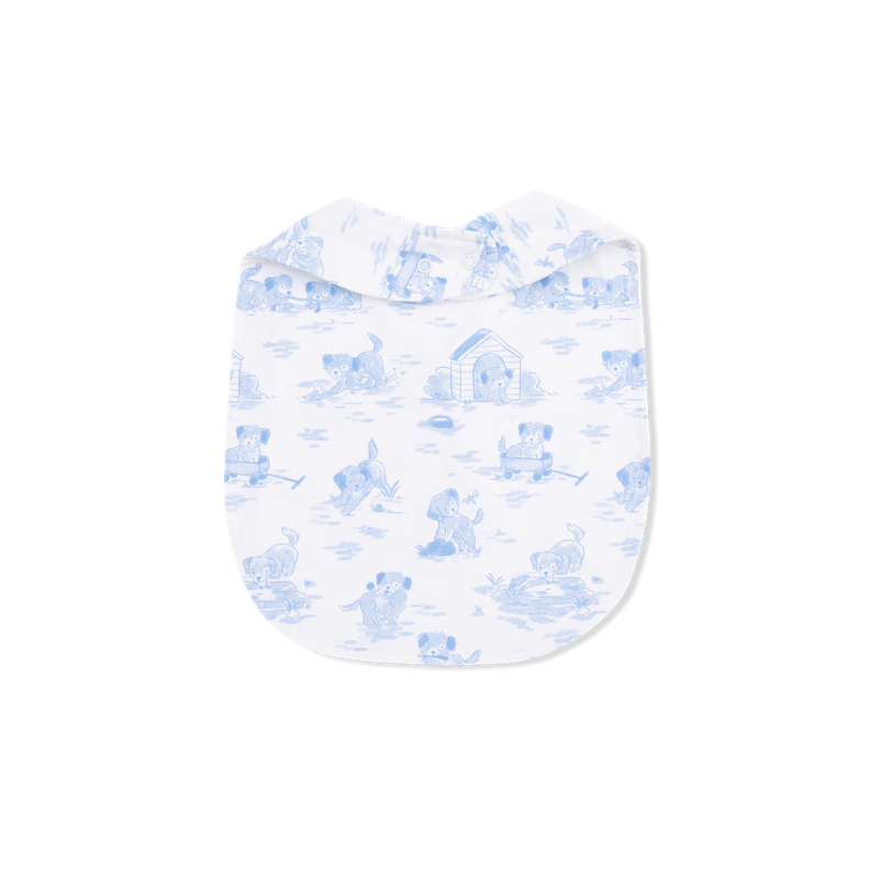 Back ofBaby bib with blue  puppy pattern on a white background