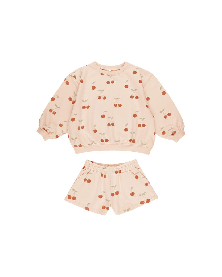 2 piece terry set, long sleeve top and shorts. Beige/pink with red cherries all over. 