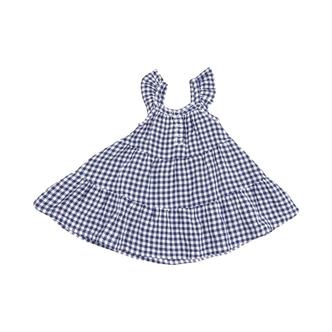 back of navy gingham dress with three snaps at the top of the dress. 