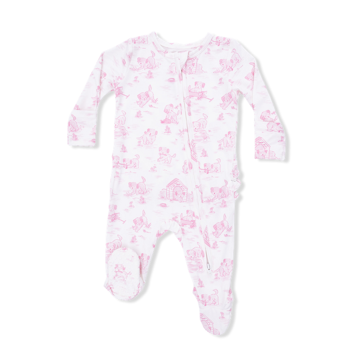 Baby onesie with pink puppy pattern on a white background