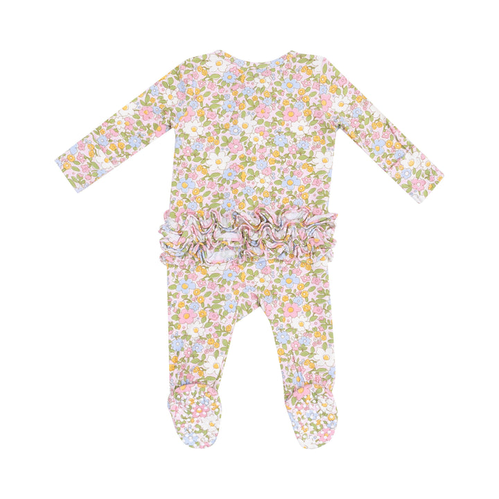 the back of the baby footie with rubber stoppers on the feet and ruffles on the bum. 