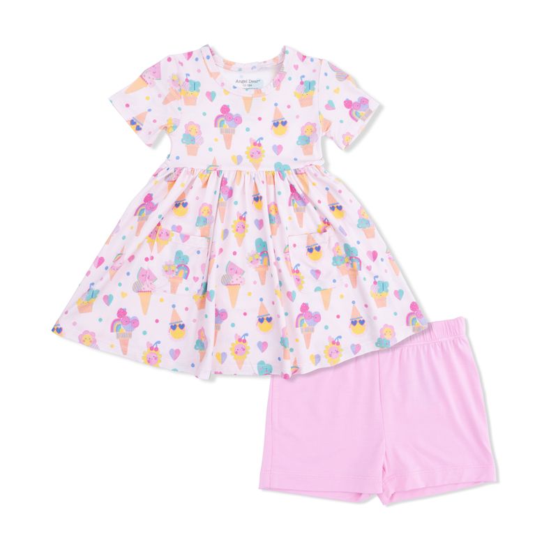 Children's dress with ice cream pattern and pink shorts on a white background