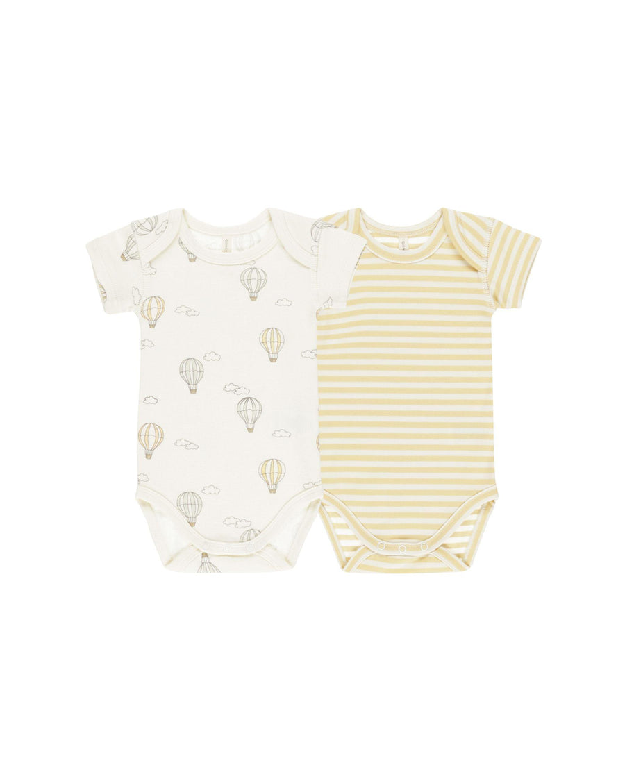set of 2 baby bodysuits, one hot air balloons print and one with beige and yellow stripe. 