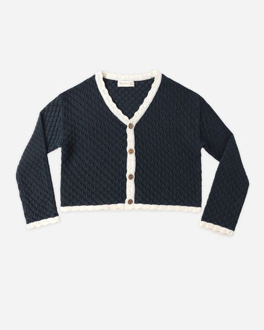 navy cardigan with white scallop trim