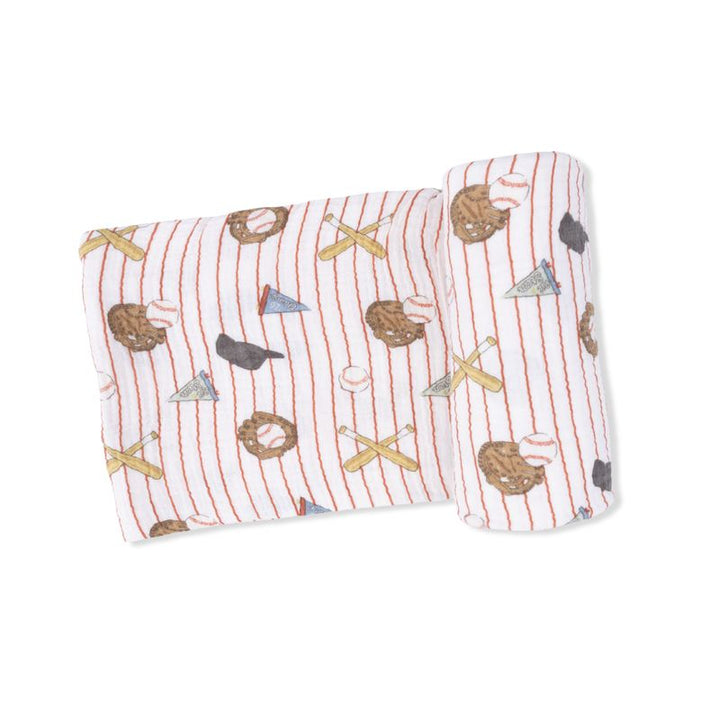 Baby blanket with sports-themed pattern on a white background