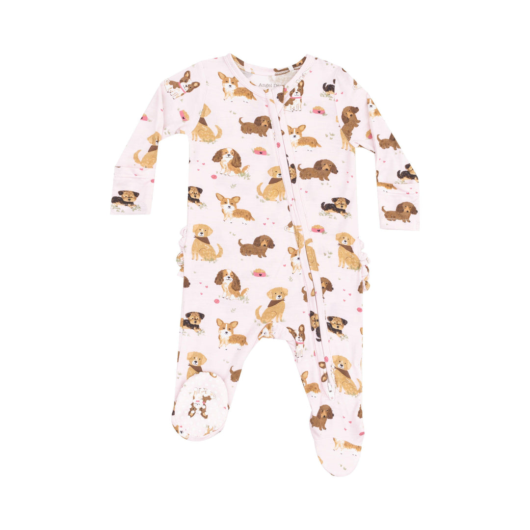 light pink baby footie with puppy print all over the footie of different breeds. 