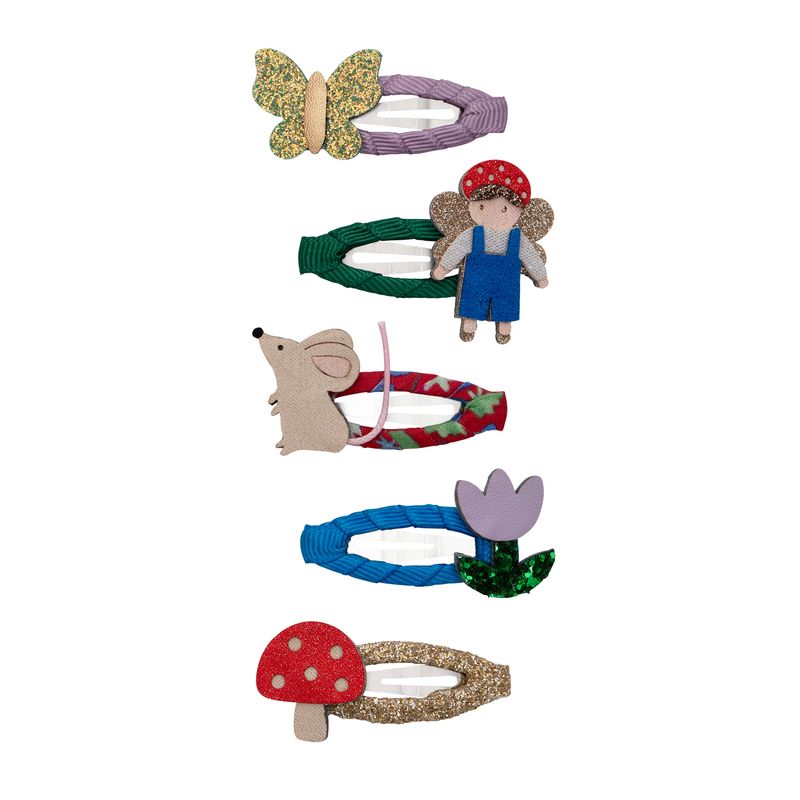 Set of colorful hair accessories including a butterfly, fairy, mouse, and mushroom on a white background.
