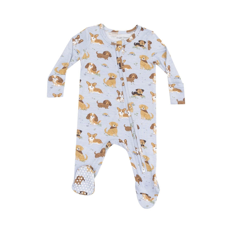 baby boy footie in blue colorway with puppies all over it. different brred dogs. 