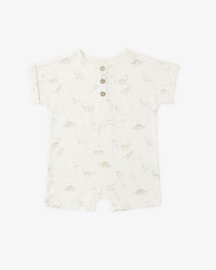  babybeige romper with subtle dinosaur pattern on a white background
