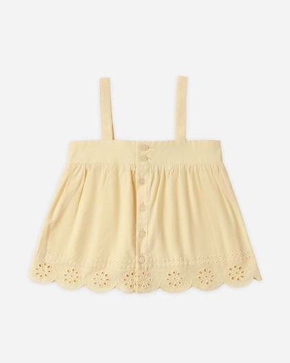 Yellow top with eyelet details with thin straps on a white background