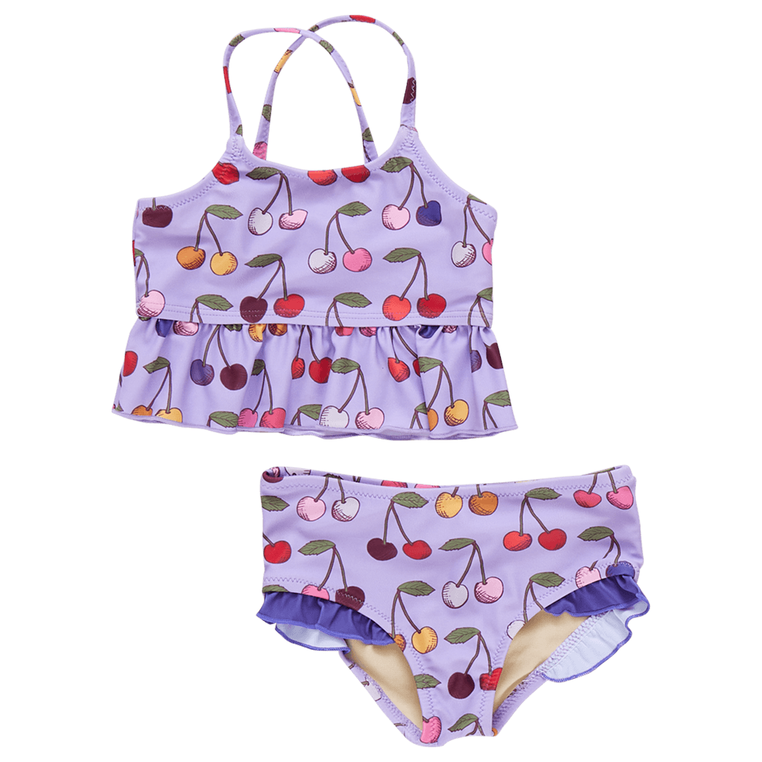 2 piece bathing suit with multi colored cherries all over it. the top has criss cross straps and a big ruffle at the bottom. the bottom has tiny ruffles along the opening of the leg. 