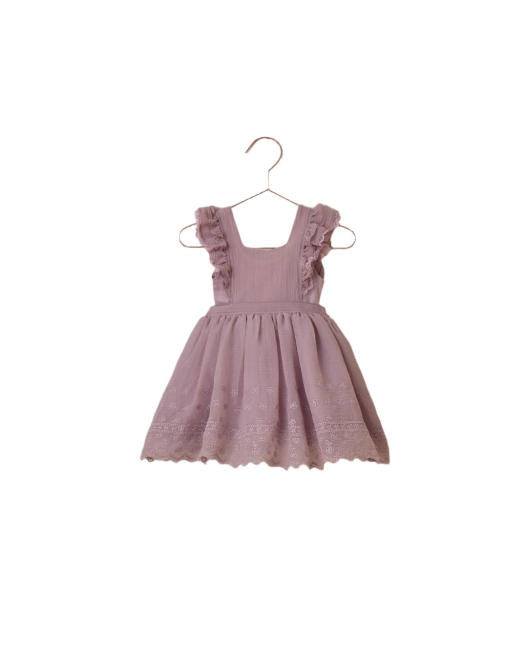 lavender pinafore with scallop lace bottomedging and lace ruffles at the sleeve