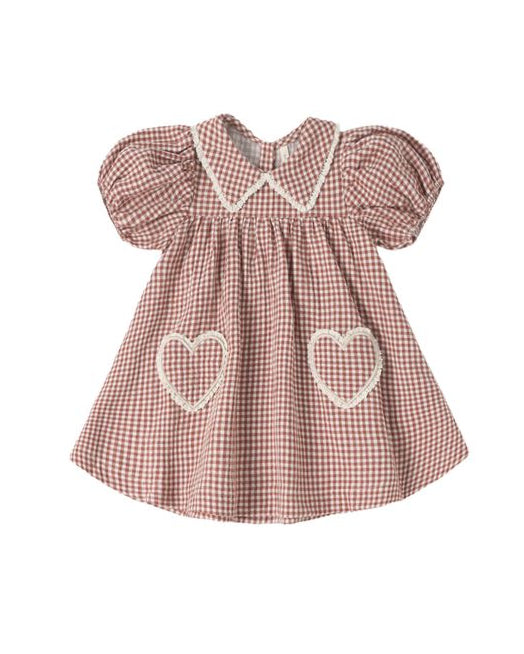 Red and white checkered dress with heart designs on a white background
