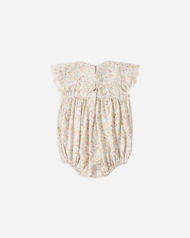 Back of Floral-patterned baby romper on a white background