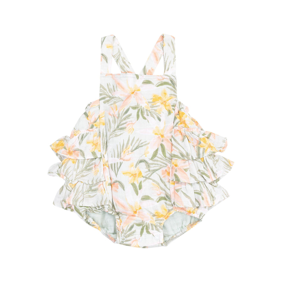 baby girl ruffle sunsuit with peach and yellow tropical looking flowers. criss cross straps and ruffles on the bum