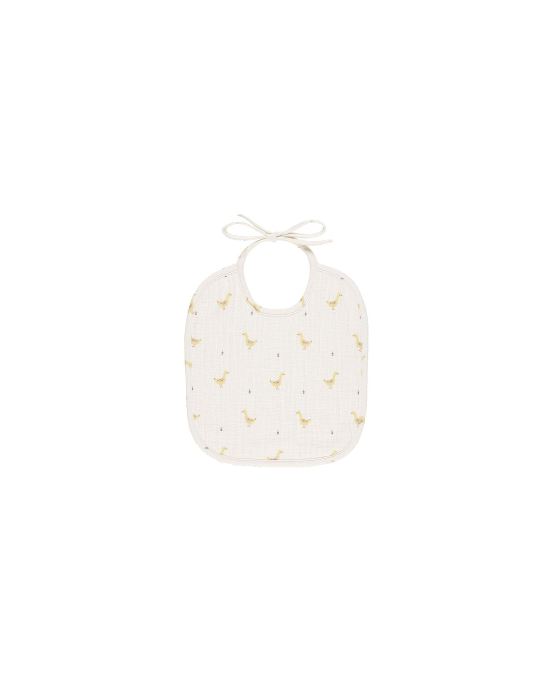beige bib that ties around the neck with yellow geese all over the bib