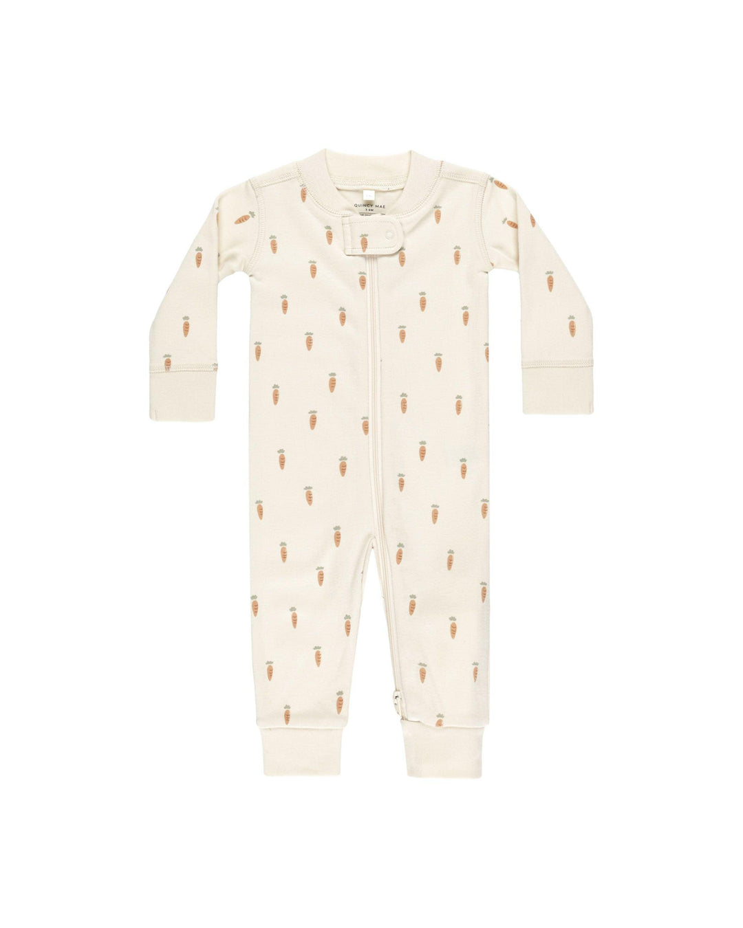 beige zipper onesie outfit with tiny orange carrots all over the onesie