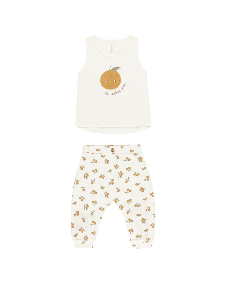 tank and slouch pants set. tank has an orange on it that is smiling and pants have lots of little oranges on the pants. 