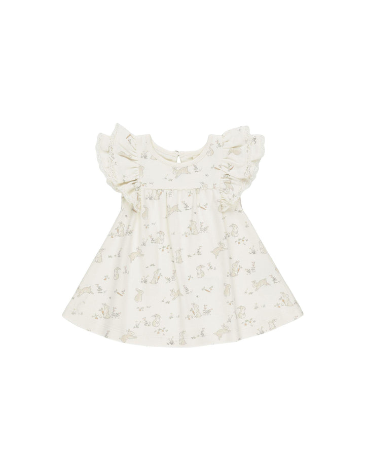 organic cotton flutter sleeve dress with ruffles on the sleeve and tiny bunny print all over the dress. 