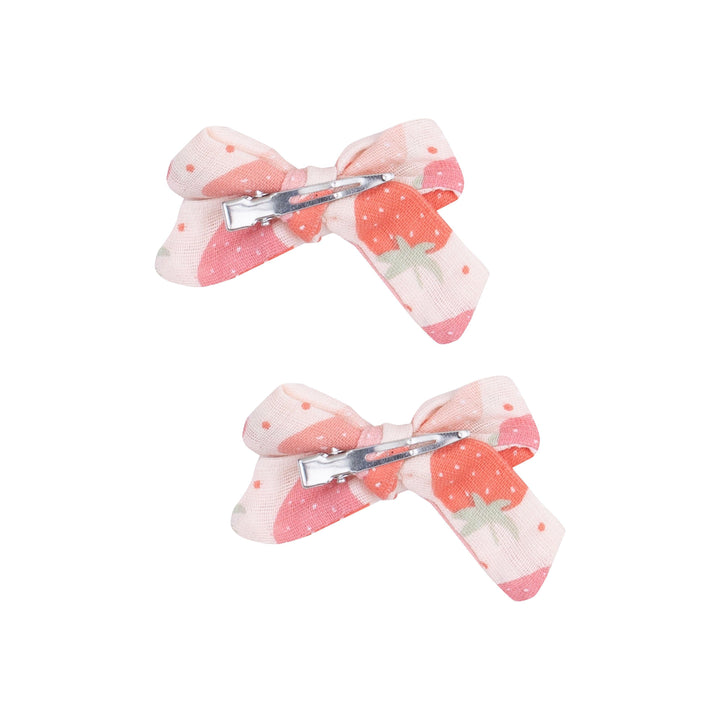 back of hair bows with alligator clips. attached 