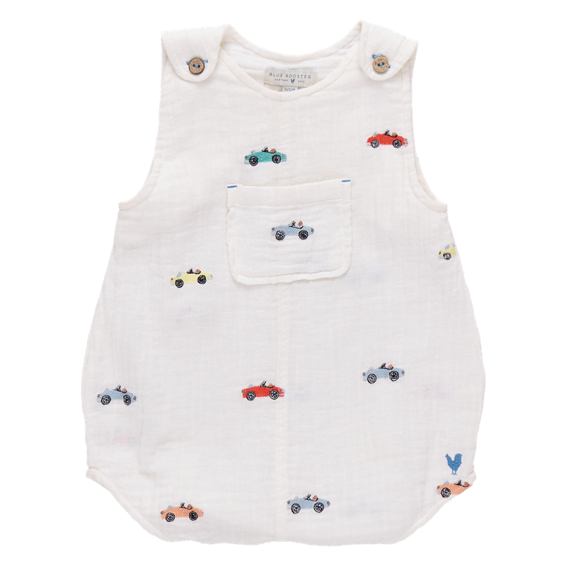 White baby romper with embroidered car designs on a white background
