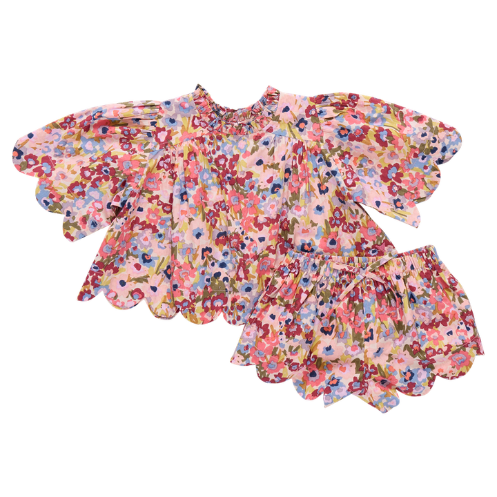 Floral 2 piece set with ruffled sleeves and bottom on a white background