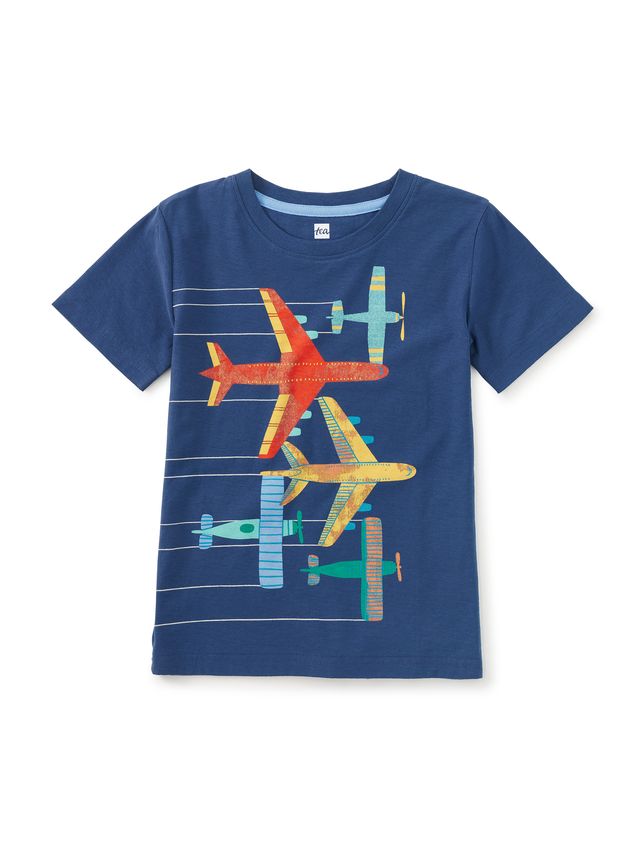 Blue t-shirt with colorful airplane design on a white background