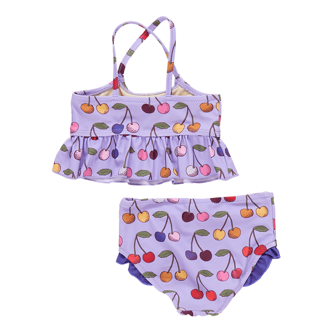 the back of the 2 piece swim suit. the back is criss cross back with big ruffle at the bottom of the top. the bottom of the suit is full coverage with tiny ruffles at the top of the leg. 