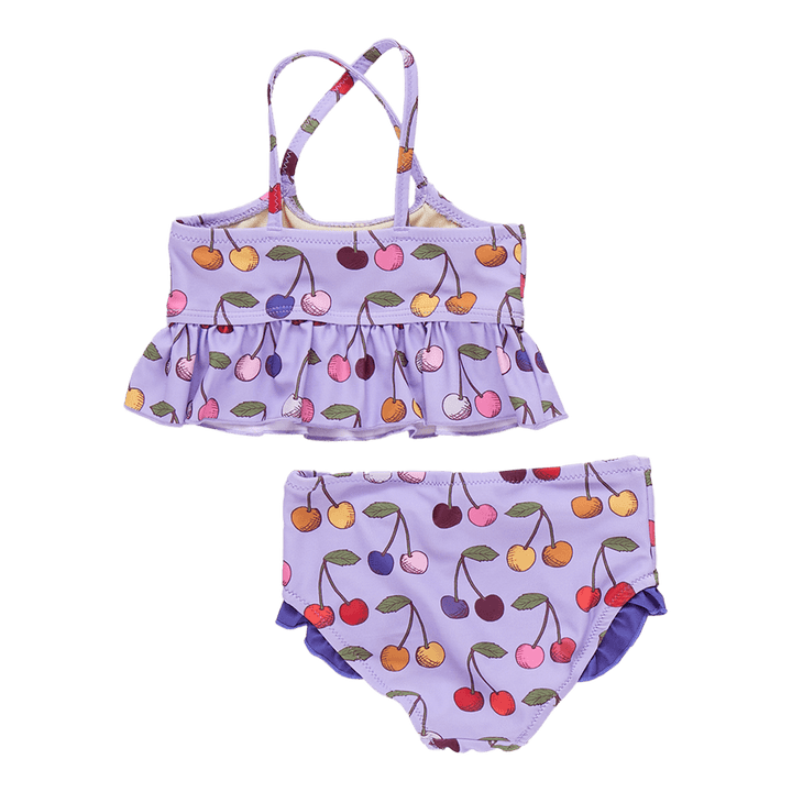 the back of the 2 piece swim suit. the back is criss cross back with big ruffle at the bottom of the top. the bottom of the suit is full coverage with tiny ruffles at the top of the leg. 