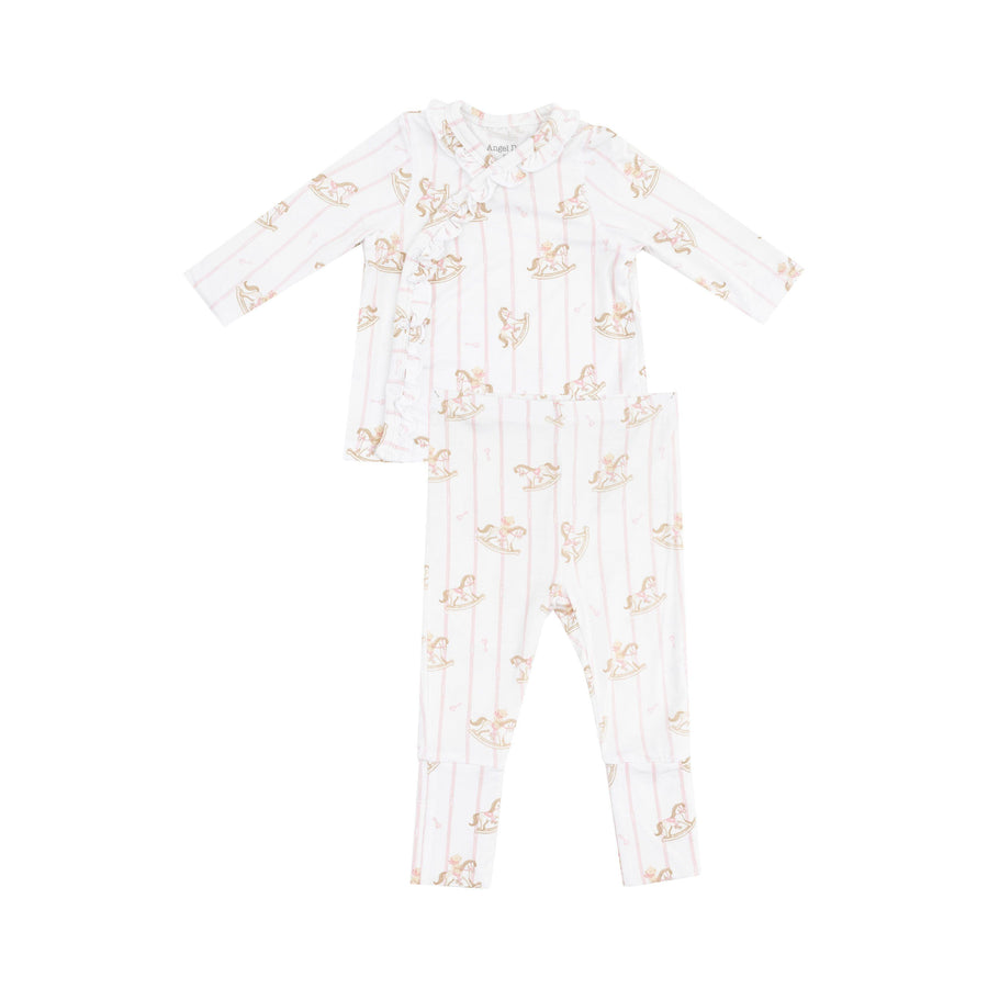 baby girl take home set with white base and pink pin stripes and rocking horse print on the set. ruffle along the seam where there are snaps for closure.