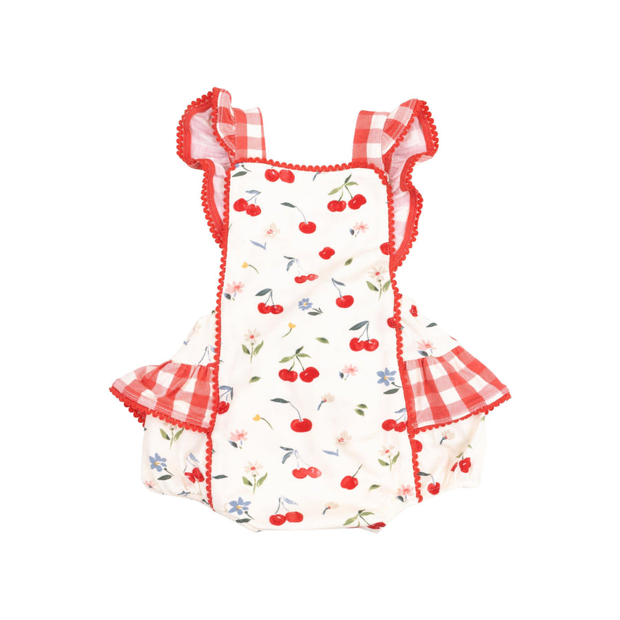 ruffle sunsuit trimmed in ric rac trim with a ruffle around the straps. water color cherries on the base of this outfit with red gingham trim at the sleeves and bum. 