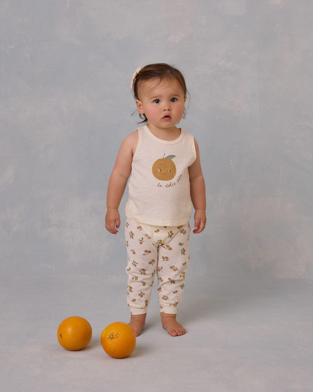 baby modeling the oranges set 