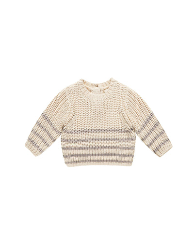 chunky knit beige sweater with gray stripes across the bottom