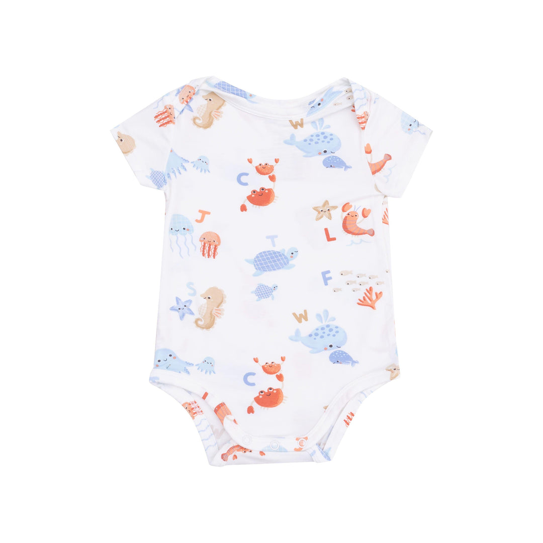 white bodysuit with short sleeves and an under the sea print with the ocean friends holding up letters of the alphabet