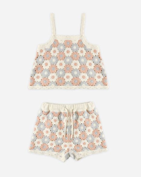 Floral patterned top and shorts set on a white background