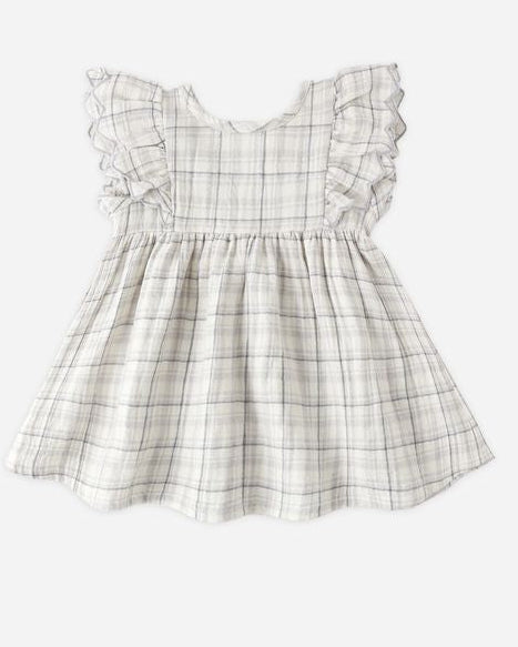 Plaid dress with ruffled sleeves on a white background