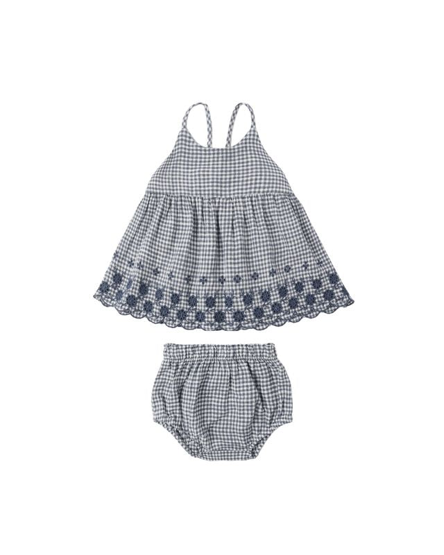 Children's blue and white checkered dress and bloomers set on a white background