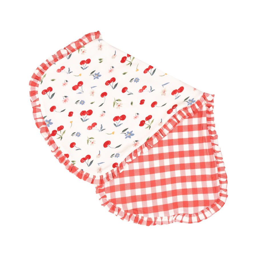 baby burp cloth with watercolor cherries on the top and red and white gingham underneath and gingham ruffle edge