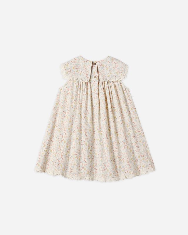 Back of Beige floral dress on a white background