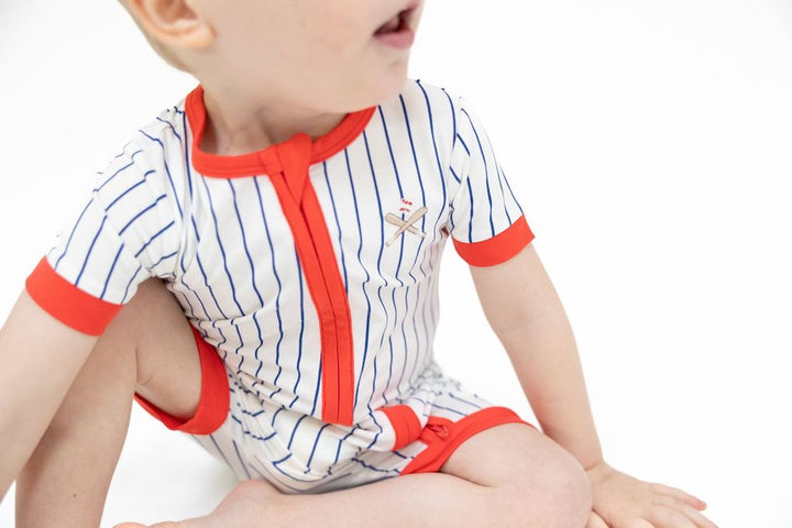 little boy wearing the baseball stripe henley shortall 