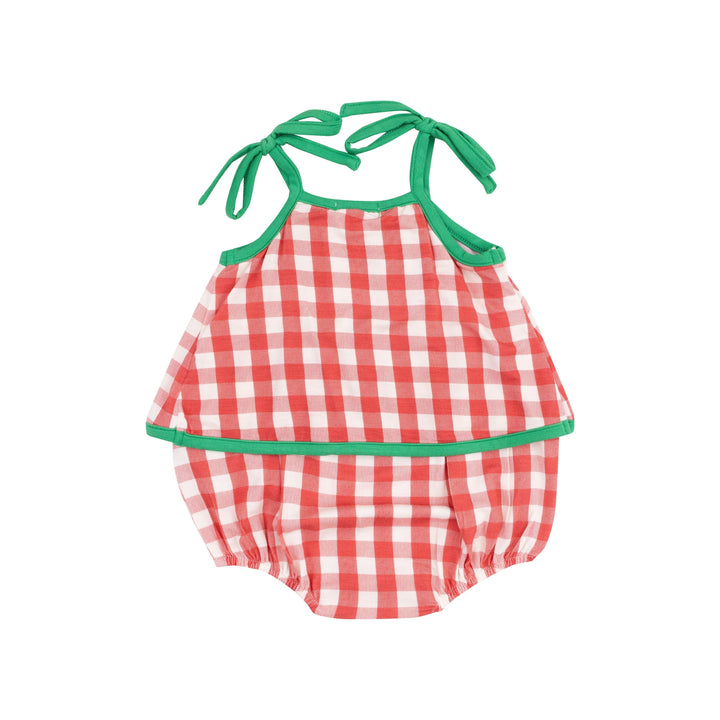 back of sunsuit with swing front continuing through the back with green trim and straps. 