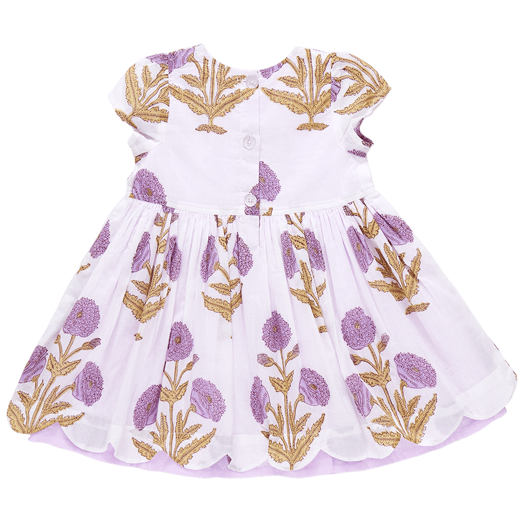 back of dress has 3 buttons. base of dress is ivory with large lavender marisol flowers on it. small cap sleeves