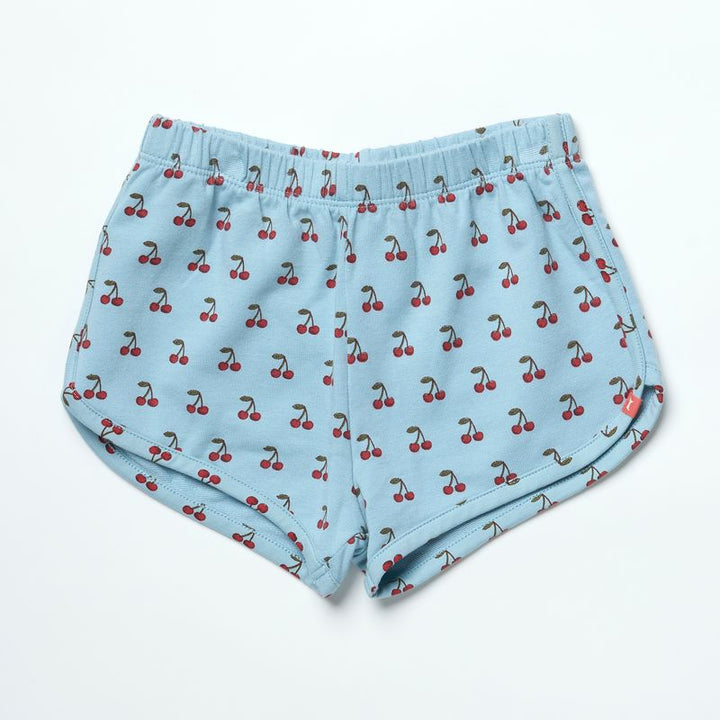 Light blue shorts with cherry pattern on a white background