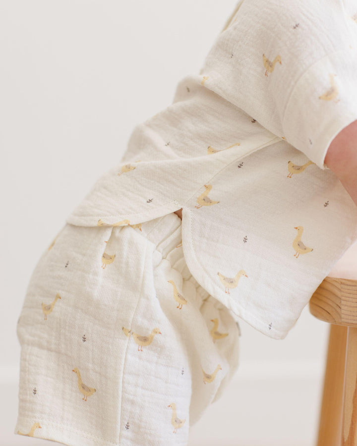 this picture shows a close up of the geese print on this outfit. 