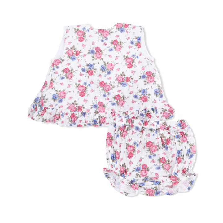 Floral baby romper with matching bloomers on a white background