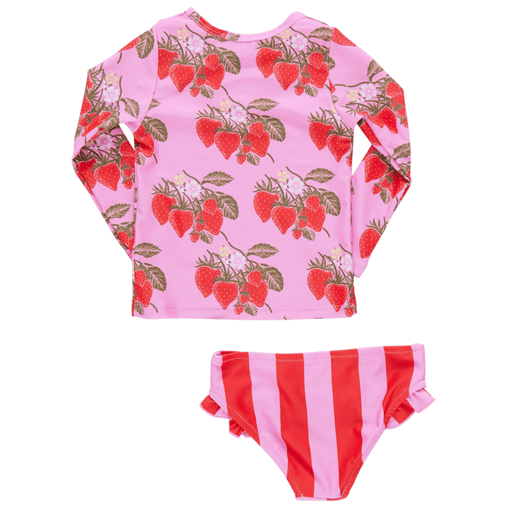 this is a picture of the pack of the rashguard set: long sleeve top pink with red strawberries all over it. the bottoms are a pink and red stripe. 