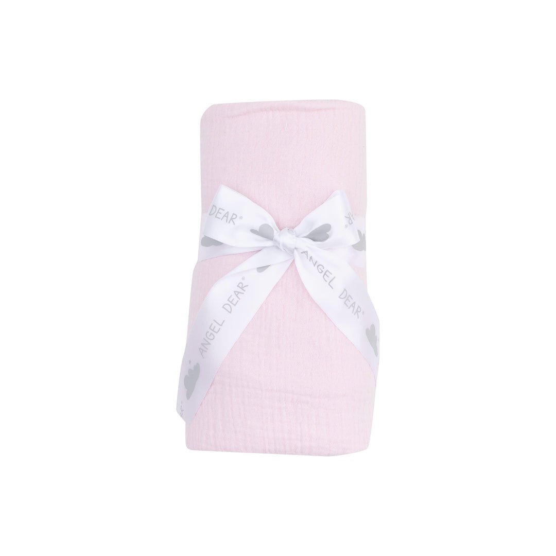 baby swaddle rolled and tied with a ribbon in a classic ballerina pink color. 