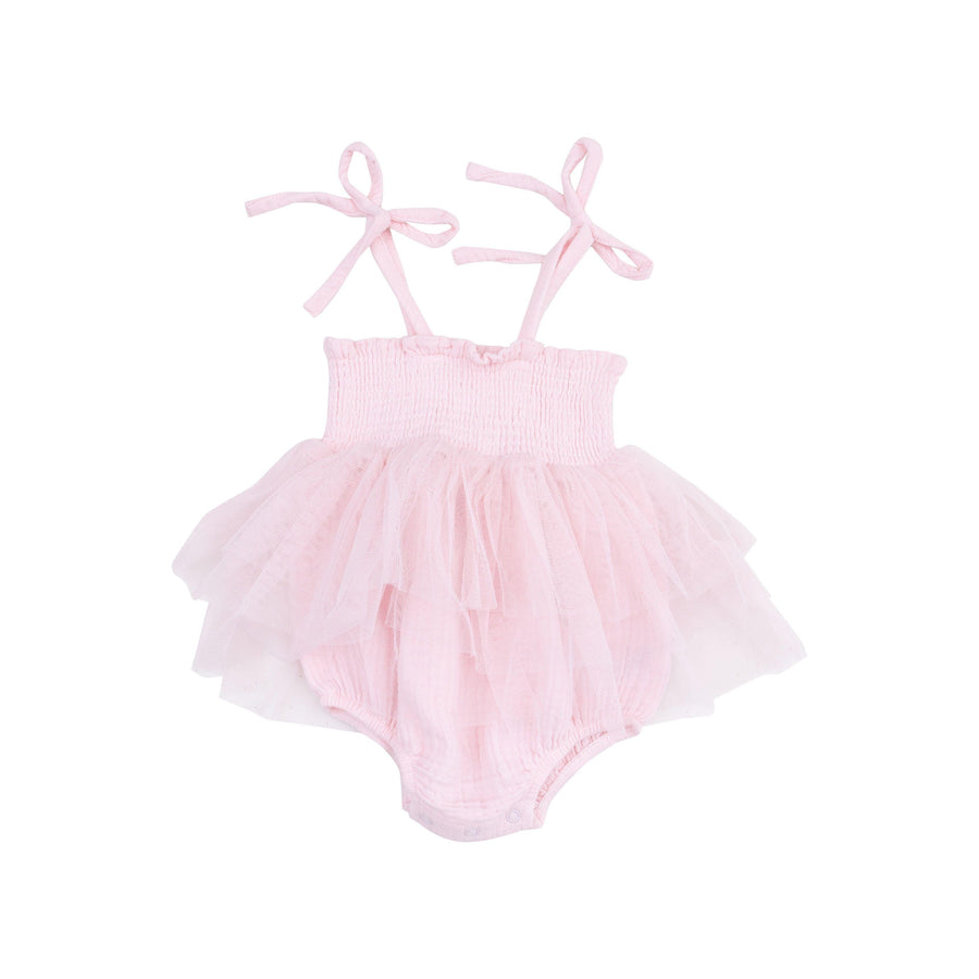 light pink smocked baby bubble with tulle skirt and ties at the shoulder and snaps at the bottom for easy diaper changes