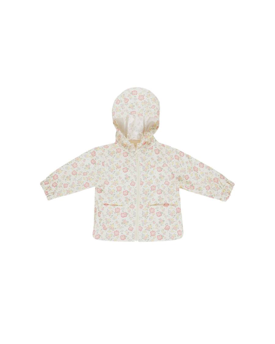 rain coat with a pastel floral print on the coat. 