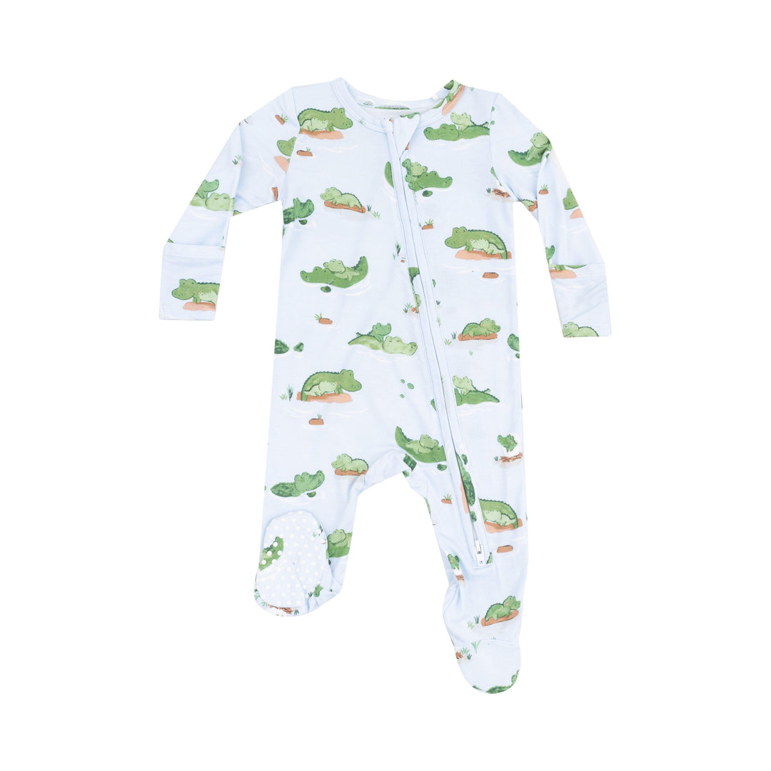 light blue baby footie with green alligators all over the footie. mommy alligator and baby alligators on the footie. 